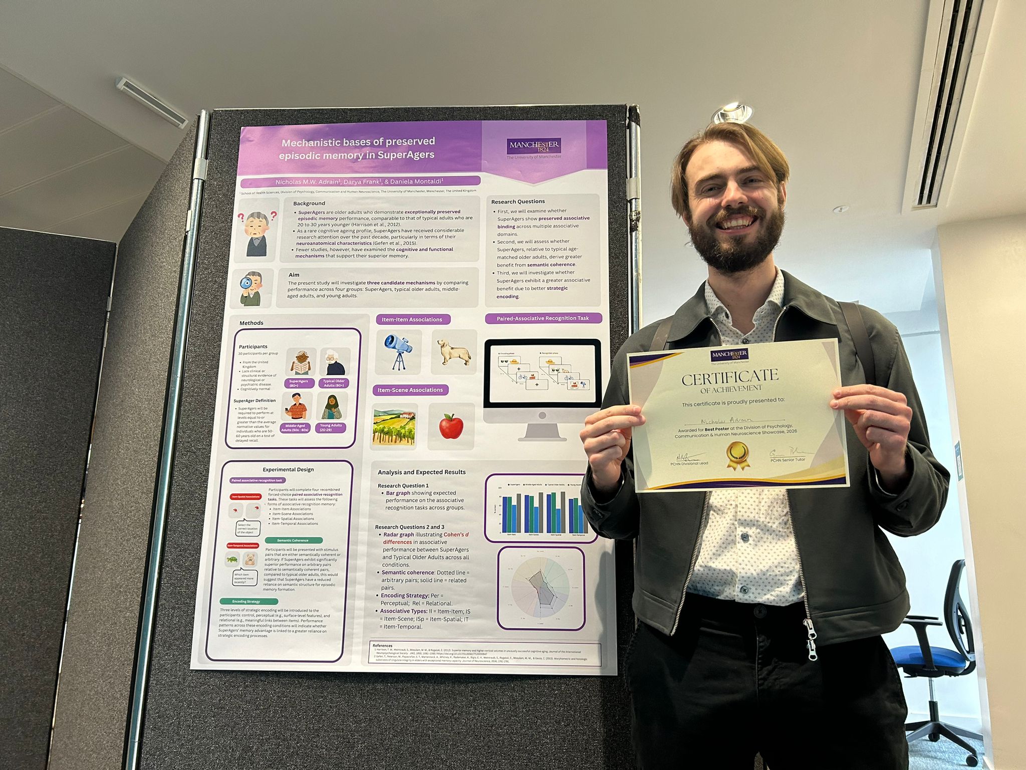 Nick Adrain receiving his poster award at the Divisional Research Showcase